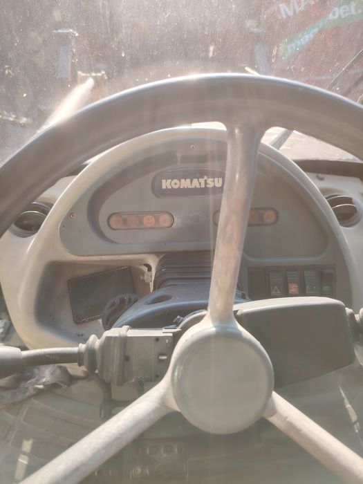 Продавам комбиниран багер