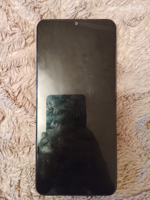 Продам новый телефон realmi note 50