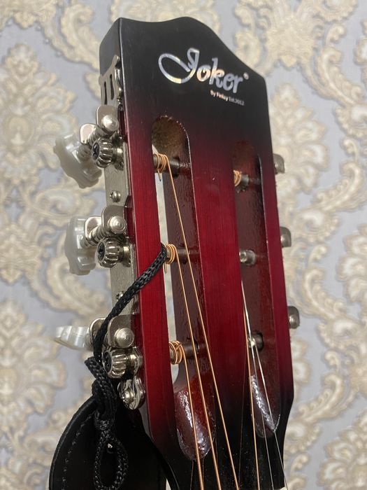 Новая гитара joker