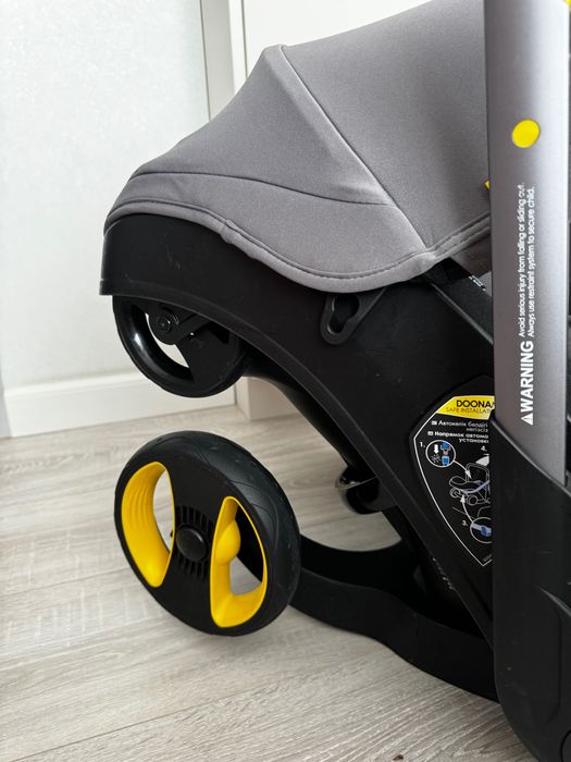 Продам коляску-автолюльку Doona