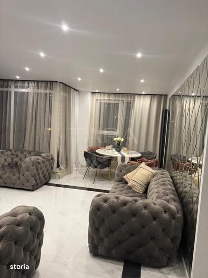 Apartament 2 camere, terasă, 2 parcari subterane, zonă centrală.