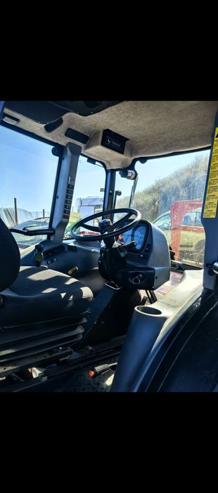 Tractor New Holland volan reversibil, freza forestiera tocător