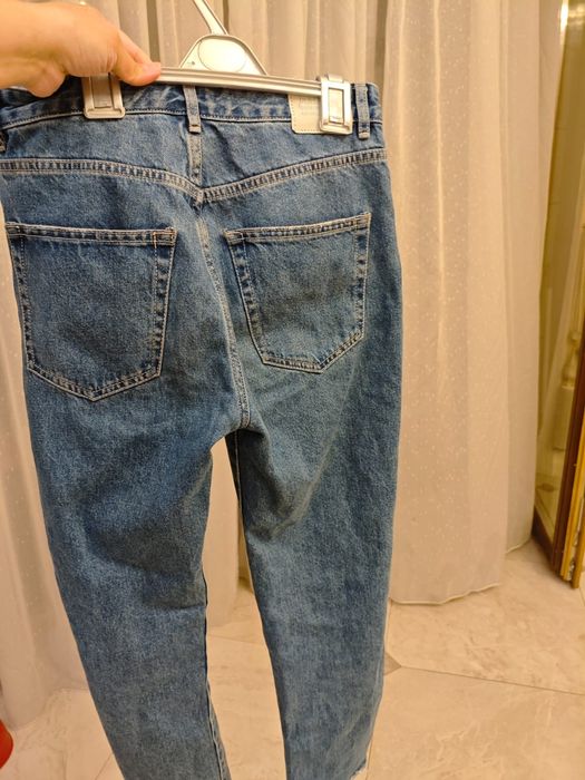 Синие джинсы женские