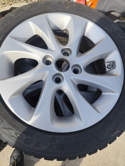 Jante aluminiu 4 X100 pe 15. Cu anvelope M+S . 185/55R15.