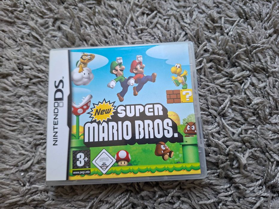 Consola Nintendo DSI, cu 2 cutie utilizata sau la schimb