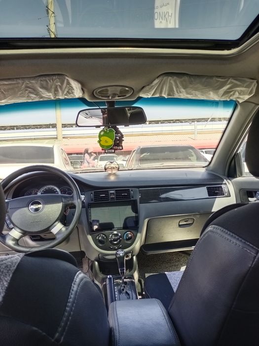 Laseti  Chevrolet 2013 yil xolati alo  avtomat  139ming yurgani halol