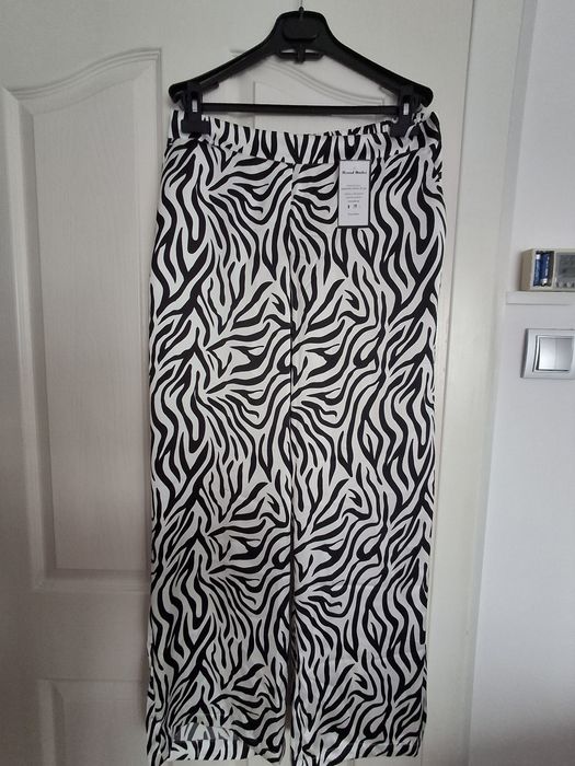 Pantaloni albi eleganți