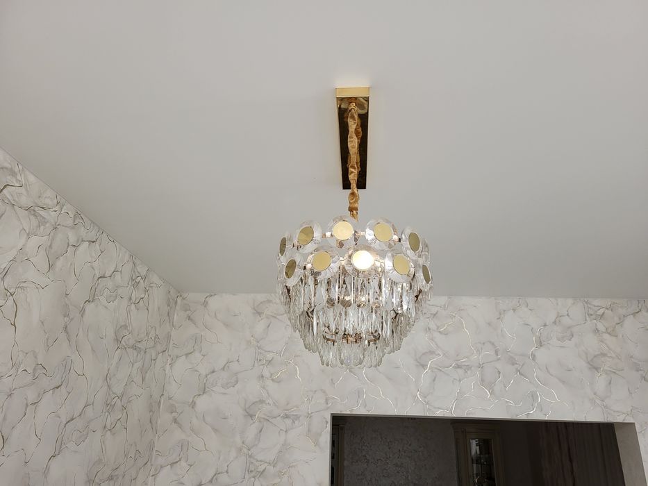 Продам люстру новую