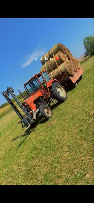 De vânzare sau schimb cu grebla braț stivuitor cu adaptare făcută pentru tractor UTB 650
