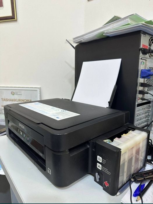Epson L 210 rangli printer + skanner qiladi yaxshi ishlab turibdi doko
