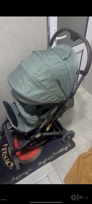 Kolaska ruchkasi oldiga o'tadi