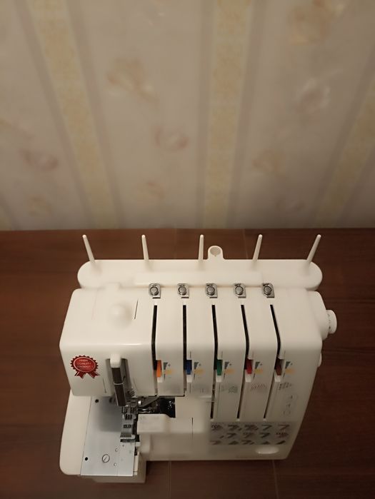 Коверлок Merrylock 5550A