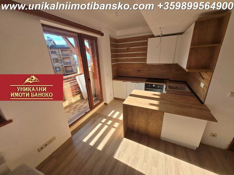 Двустаен апартамент - мезонет за продажба в Банско