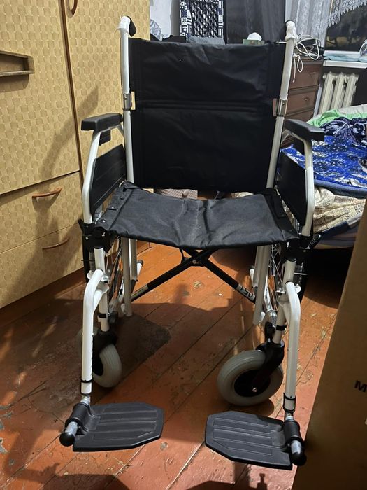 Инвалидная коляска новая