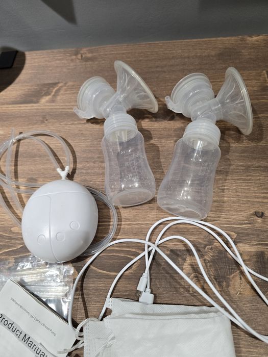 Молокоотсос Mom Help BP210 в идеале с вкладышами