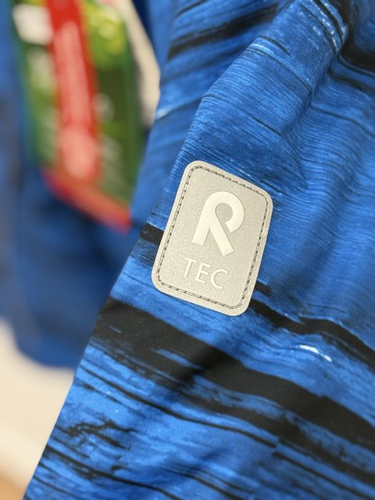 Пуховик Reima 98+6 Новый