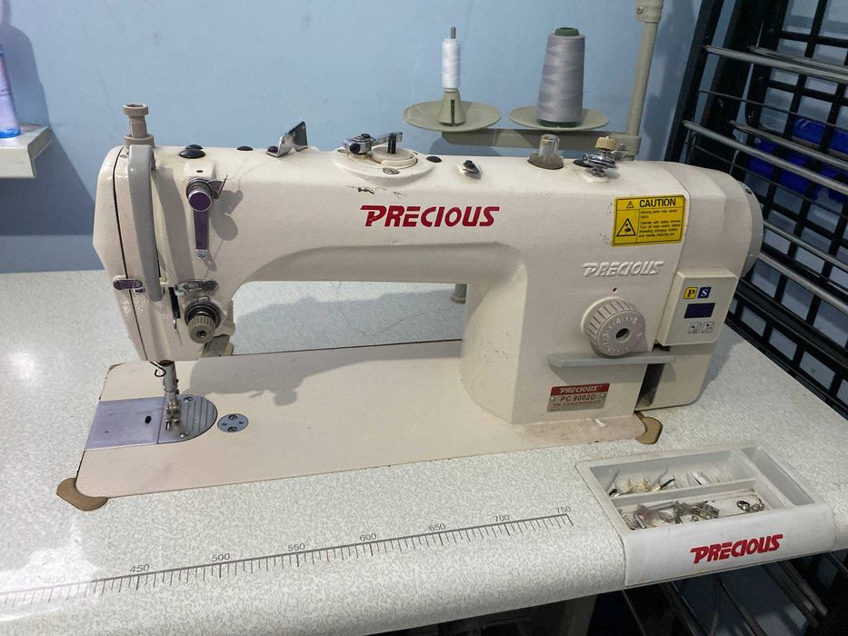 Precious tikuv mashinasi