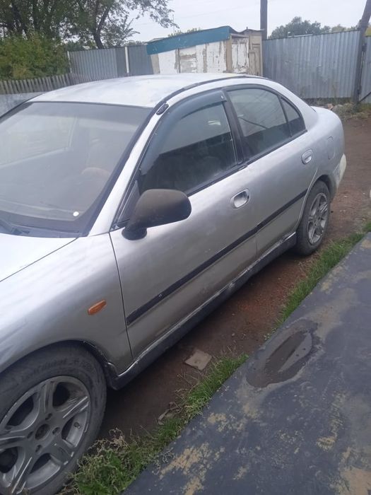 Мицубиси каризма