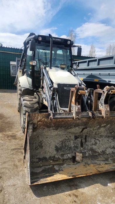 Продам экскаватор-погрузчик Гидромек НМК 102 В