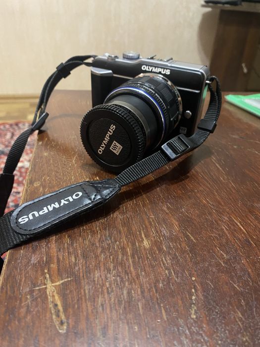 Беззеркальная камера серии Olympus PEN.