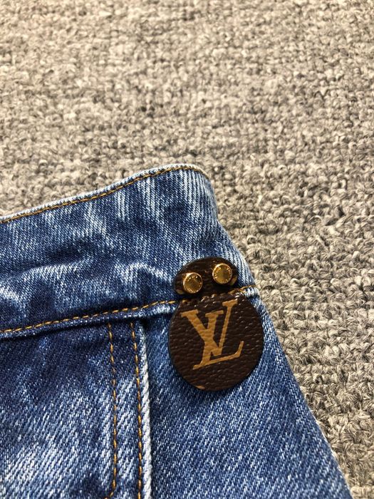 Дънкова пола с копчета и лого в златисто