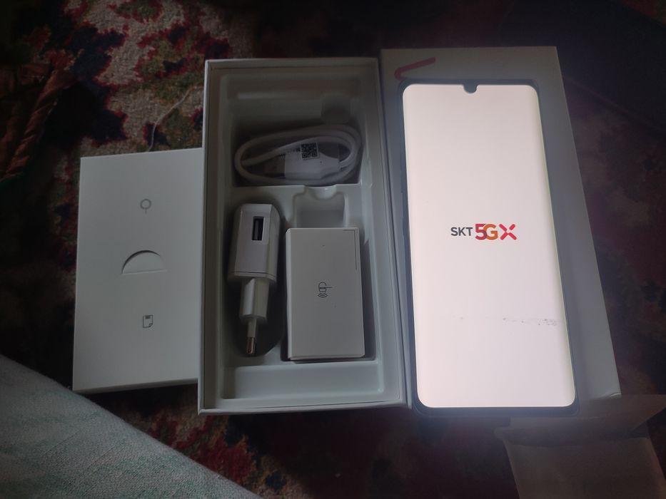 LG  телефон   5G  рассиядан  олиб   келинган  яанги  каропка  дакумт