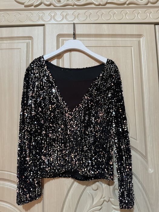 Очень красивое блестящая кофточка