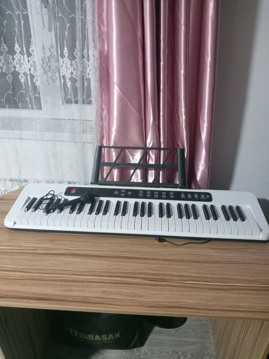 Синтезатор новый