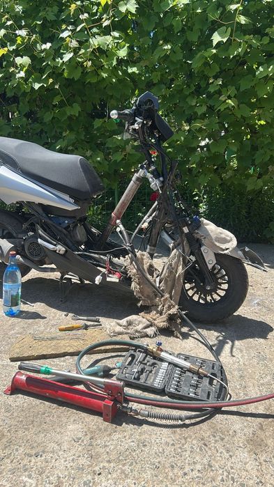 Service Mobil Scutere