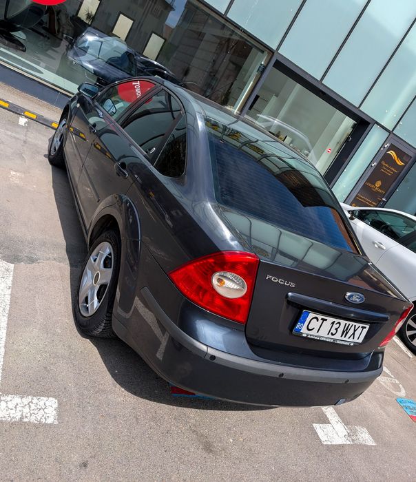 Ford Focus - pachet Ghia (Full), încălzire scaune- pilot automat- parbriz încălzit - xenon- spălător faruri