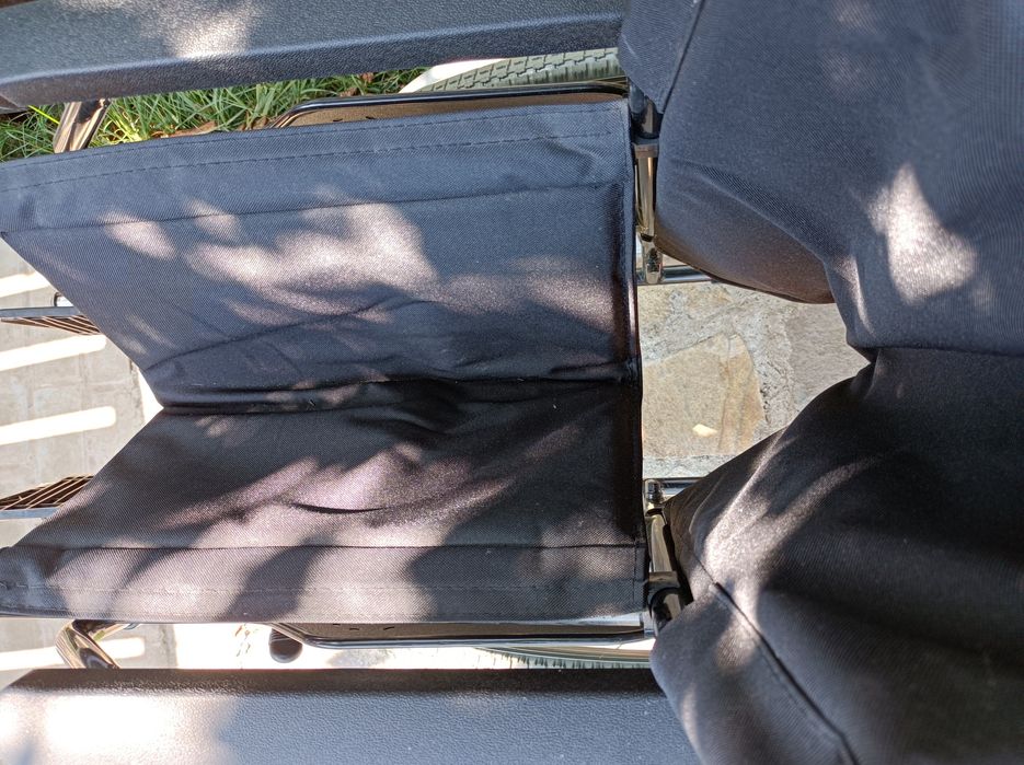 Cărucior cu rotile.