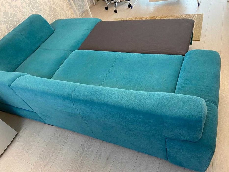 Colțar turcoaz extensibil, stare excelentă – 260 cm