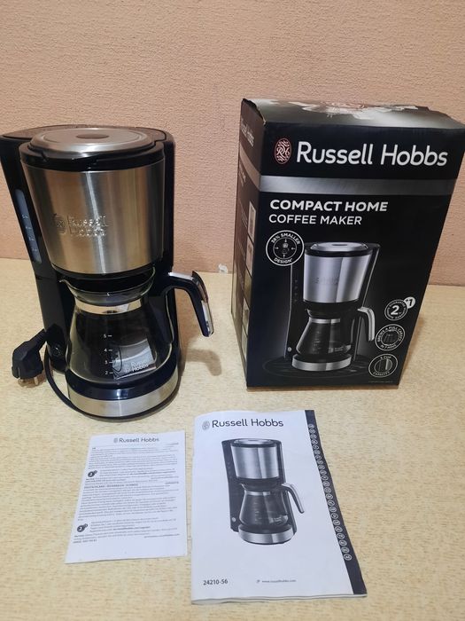 Электрическая кофеварка .