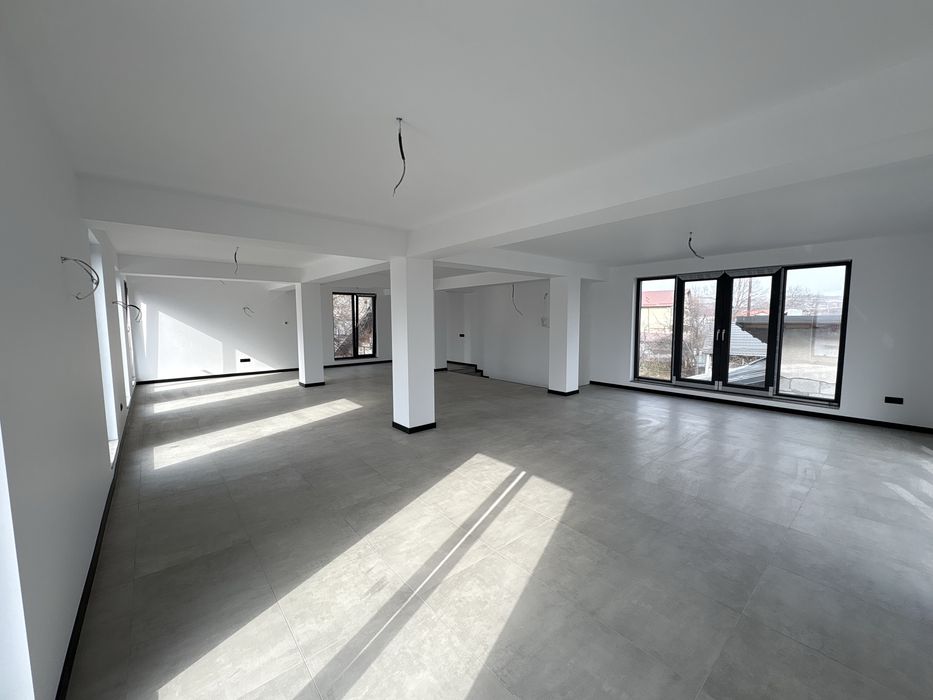 Spatiu Comercial de inchiriat  ULTRACENTRAL BAICOI P+1 si curte NOU