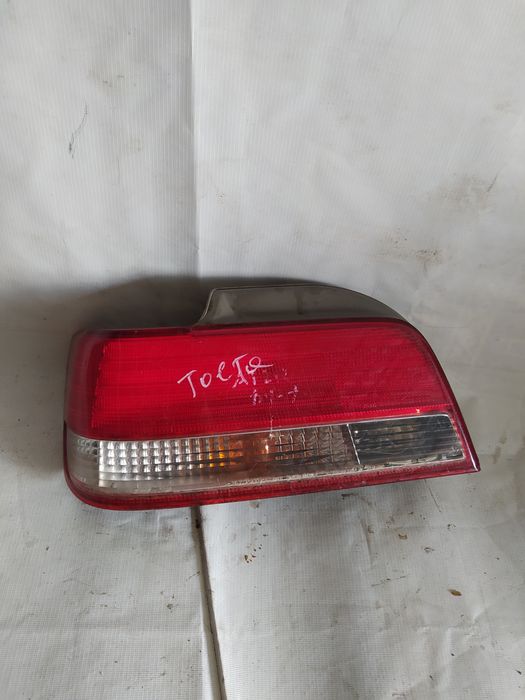 Фонарь Toyota Carina 1996 г .