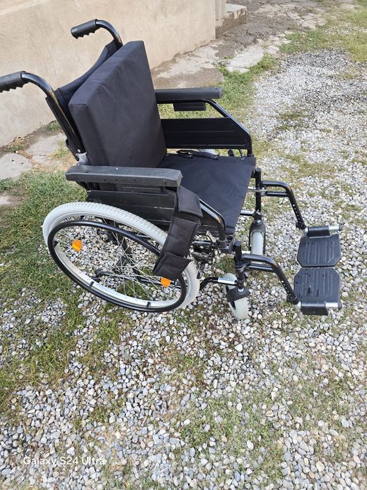 Инвалидная коляска