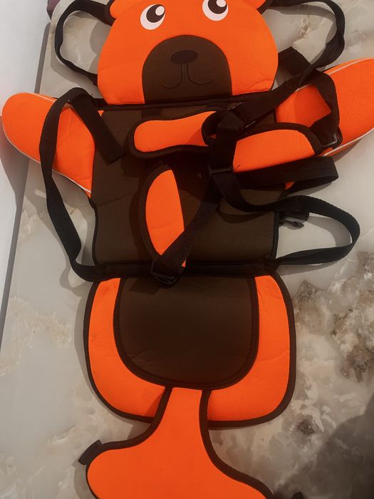 Детский ремень безопасности.