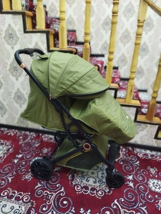 Прогулчная коляску