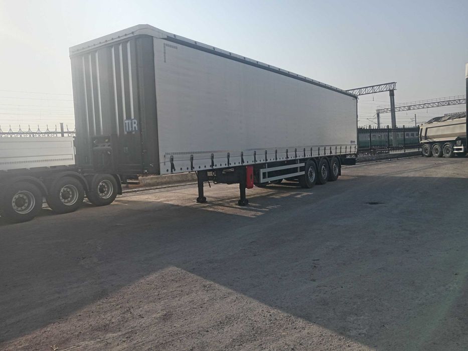 Полуприцеп тентовый (шторный) объём 92 куб.м