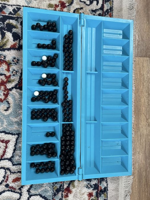 Тогыз кумалак игра