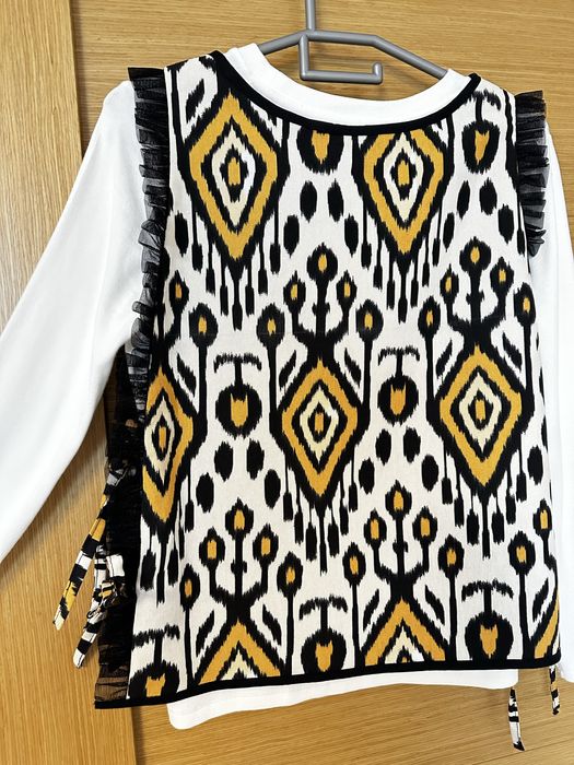 Жилет необычного дизайна