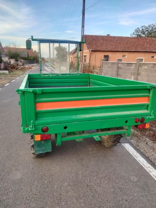 Vand motoagricola 18 ca și tractor 445 plus utilaje aferente pentru tractor freza de 170 plug cu doua câmpuri tocătoare de resturi vegetale și remorca