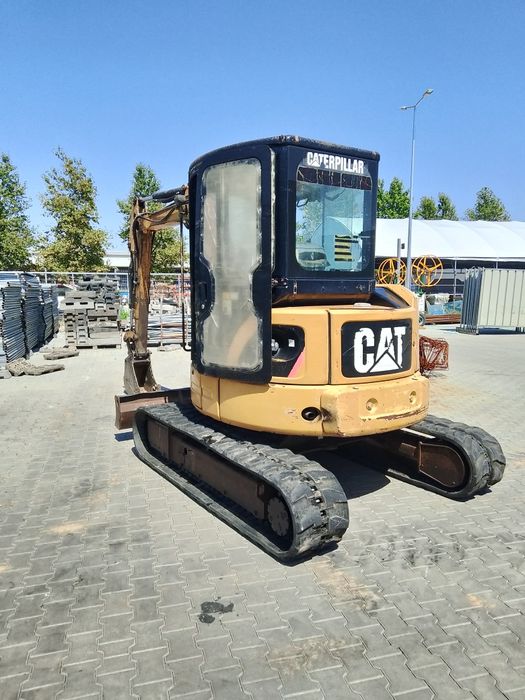 Багер  CAT 304CR