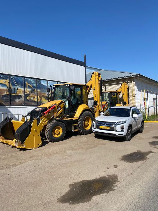 Экскаватор погрузчик Caterpillar 428 сборка Англия