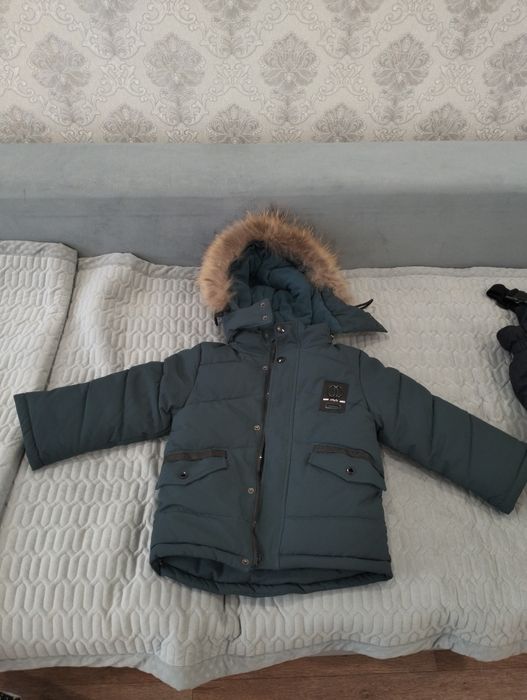 Продам Пуховик на 5-6 лет.