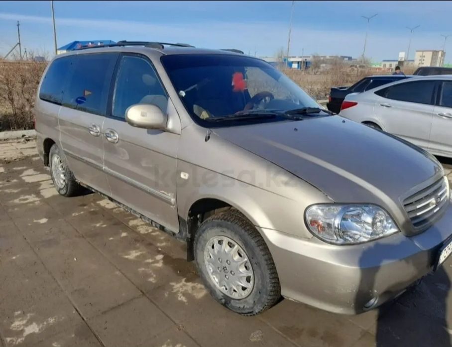 Киа карневал 2003 г 2,5 бензин