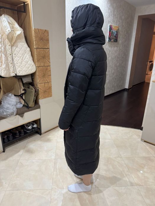 Продам пуховик зимний новый