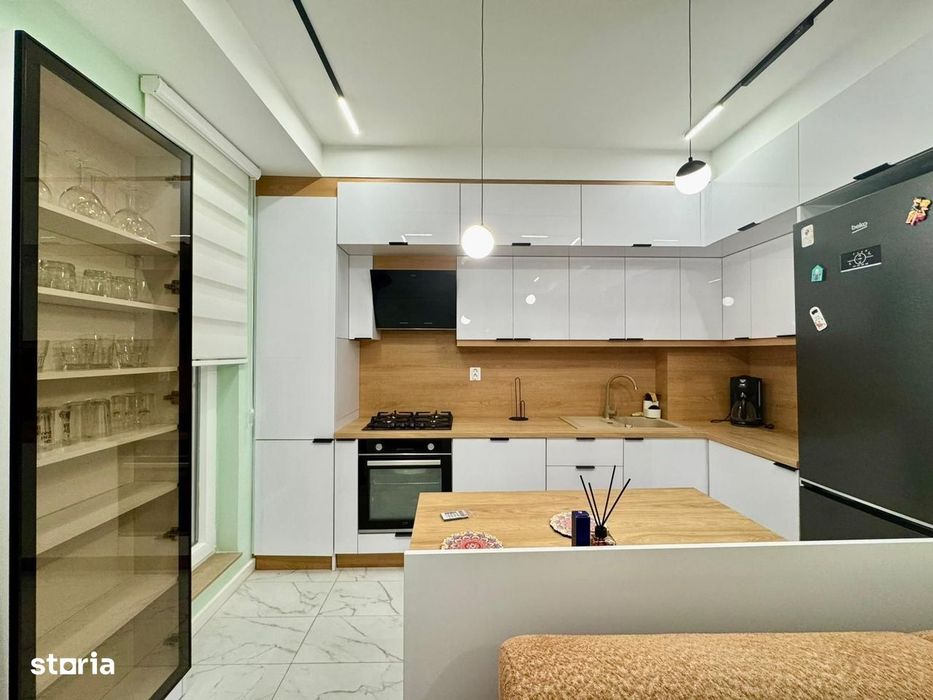 COSMOPOLIS - Apartament cu 3 camere si gradina, mobilat si utilat.
