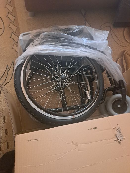 Инвалидная коляска