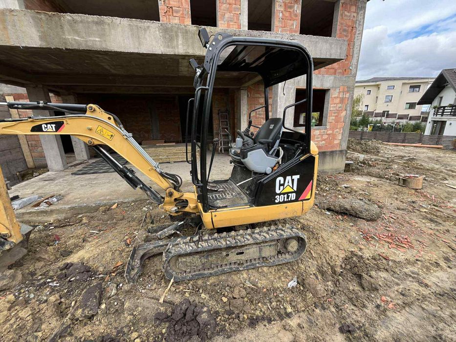 Inchiriez miniexcavator Caterpilar 1,9t, trancher provesional,rem baculabila, mai, dr